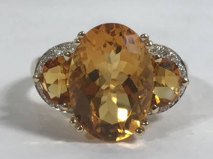 14k citrine and diamond ring, 3.4 dwts: 14k citrine and diamond ring, 3.4 dwts. Ring size:8.5.Allthough normally I would not include a "Made in China"ring in one of my sales, this one is quite beautiful.The citrine color is a marvelous