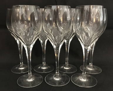 Seven Tiffany crystal wine glasses: Seven Tiffany crystal wine glasses. 7" high.