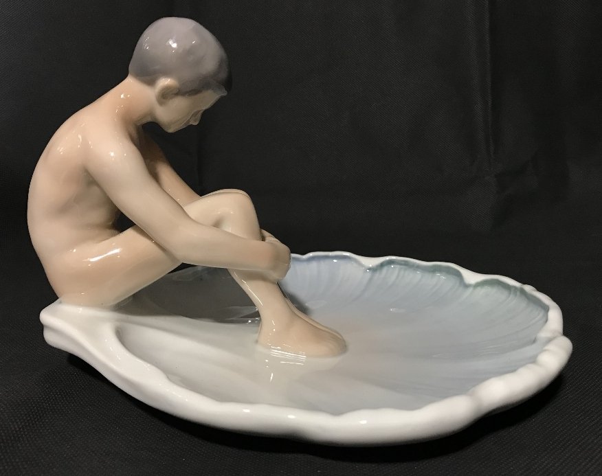 Bing & Grondahl fig, boy on a lily pad, circa 1960: Bing & Grondahl boy on a lily pad, circa 1960. 8.5" dia and 6" high.