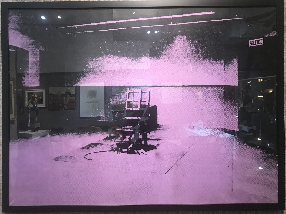 "Electric chair" by Sunday B.Morning, after Warhol: "Electric chair"by Sunday B.Morning, publisher.Numbered 82/250. 39" x 51", frame: 40"x 52".Andy Warhol originally gave negative prints to a group called Sunday B Morning to extend the run of some of h