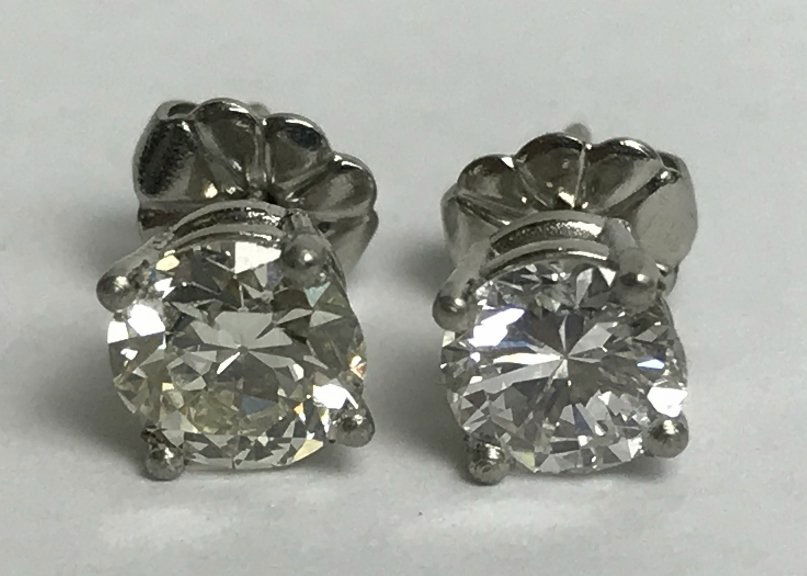 Platinum and diamond stud earrings, 1.2 dwts (1 of 4)