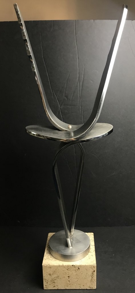 Modern stainless steel sculpture with pearl (1 of 6)