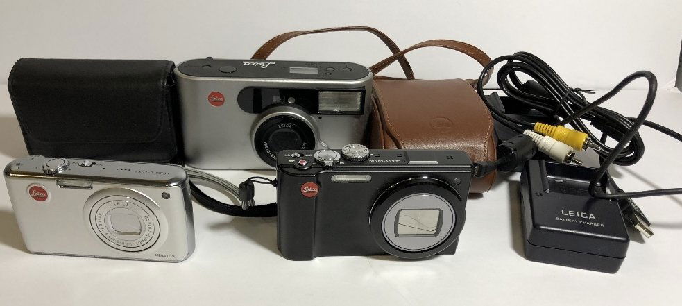 Three modern Leica cameras and chargers (1 of 4)