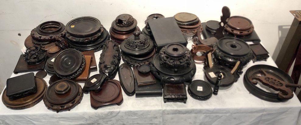 Fifty eight Chinese wood stands and parts (1 of 5)