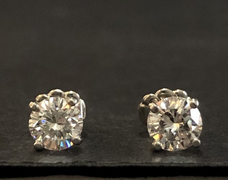 Platinum diamond studs, .65/.68ct, GIA E color (1 of 9)
