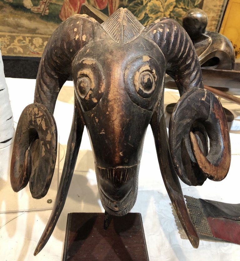 Carved wood ram's head mask (1 of 5)