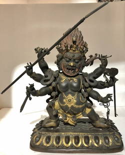 Tibet gilt copper Buddha, 18th/19th century, 15"high: Tibet gilt copper Buddha, 18th/19th century,15"high.Possibly depicting Hayagriva, the horse protector or Shadbhuja Mahakala(Six armed protector).The items held in the six arms and hands, are cast sepa