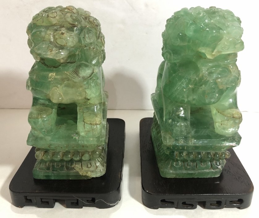 Pair of Chinese fluorite Foo Dogs: Pair of Chinese fluorite Foo Dogs. H 6" x 4" without stand.