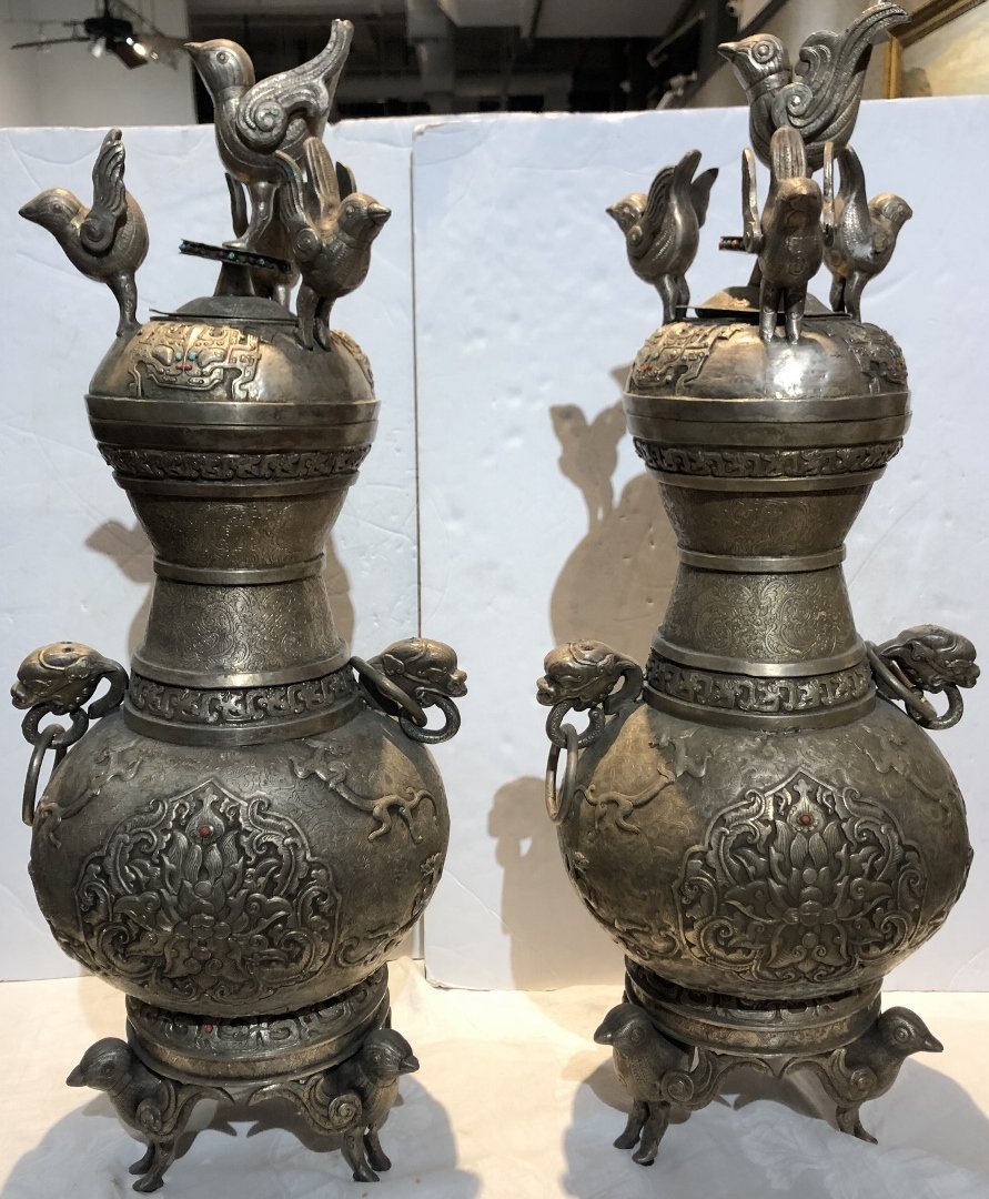 Pair of Mongolian vases with stones 28"high each.: Pair of Mongolian vases with stones.28 inches high each.