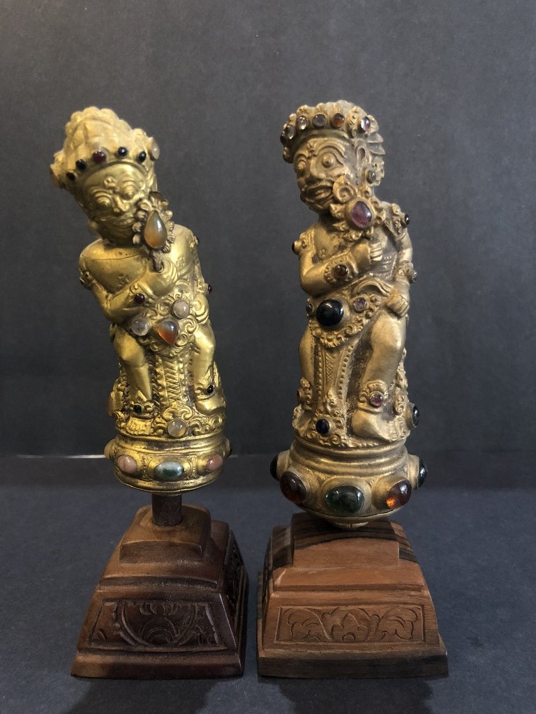 Two Bali Kris handles with inlaid stones: Two Bali Kris handles with inlaid stones, 7" high