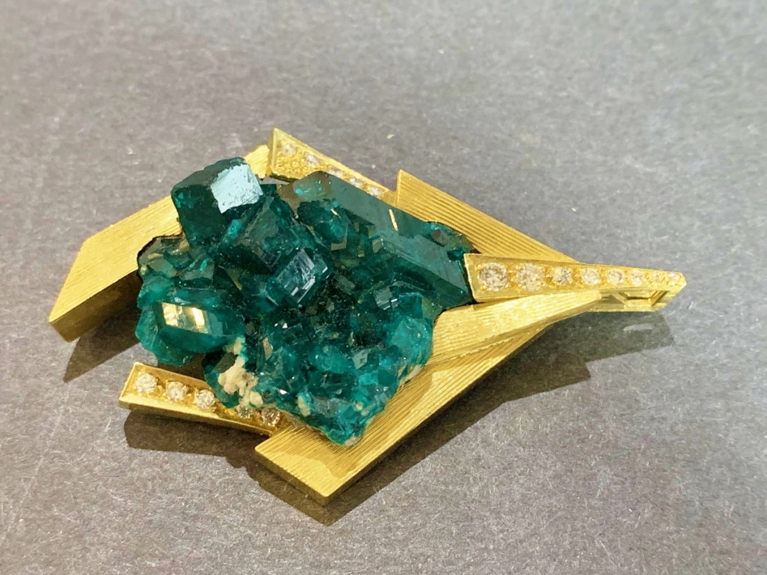 18k diamond Andrew Grima brooch 15.7 dwt: 18k diamond Andrew Grima brooch 15.7 dwt.There are 17 round F color full cut diamonds,that range from.02 to .10, for an average weight of .06cts each, for a total diamond weight of approximately 1 car