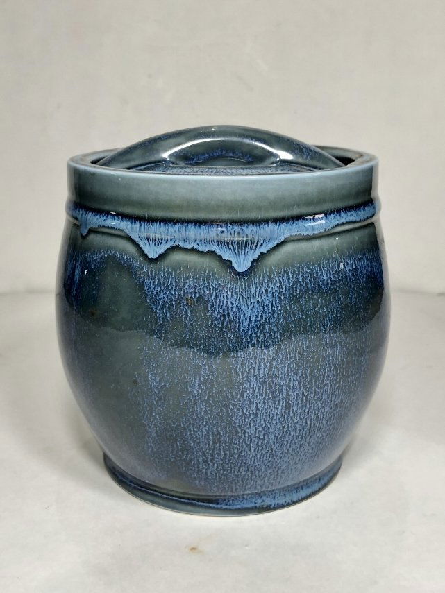 Alfred Dunhill ceramic tobacco jar,Sams: Alfred Dunhill ceramic tobacco jar,Sams. 5"x 5.25".Sam's Place was an antique shop on West 25th street in NYC.It was owned by Samuel Palmero and sold jewelry, objects and canes.After Sam's passing las