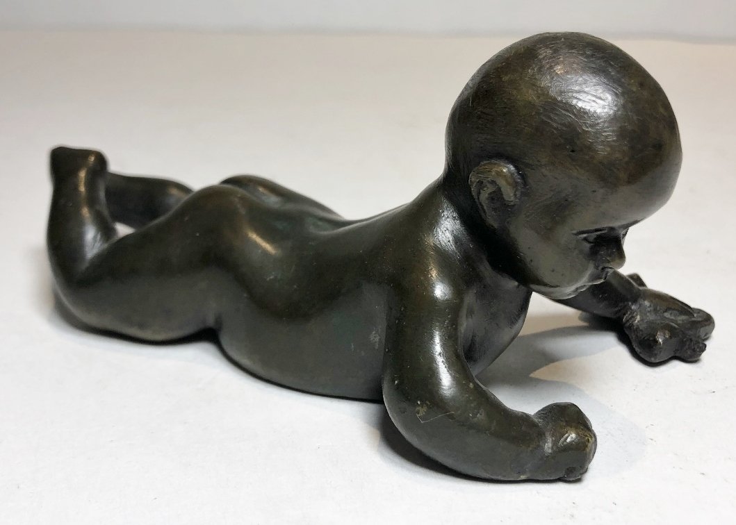 Bronze baby crawling by Giorgio Sommer: Bronze baby crawling by Giorgio Sommer. 6"x 2.5"