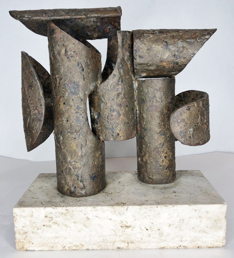 Modern stone and metal sculpture: Modern stone and metal sculpture.Possibly cast iron.Found in an estate in the Washington Square part area near NY University.9 inches by 11 inches by 4 inches.Probably from the 1950-1965 time period.