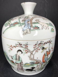 Chinese porcelain circular box with writing: Chinese porcelain circular box with writing. Dimensions: 6" high with lid.