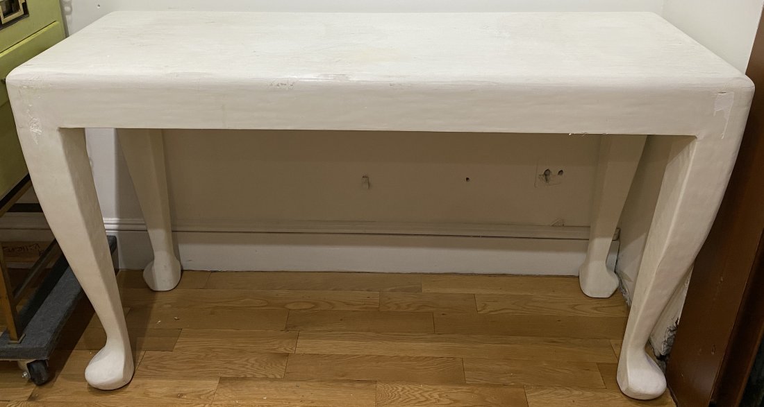 Modern table: Modern table. Height:32 inches, length:54.5 inches, width:19 inches.Some damage to the corners, revealing the material construction underneath.From the Estate of Lloyd Williams, FIT graduate, fashion 