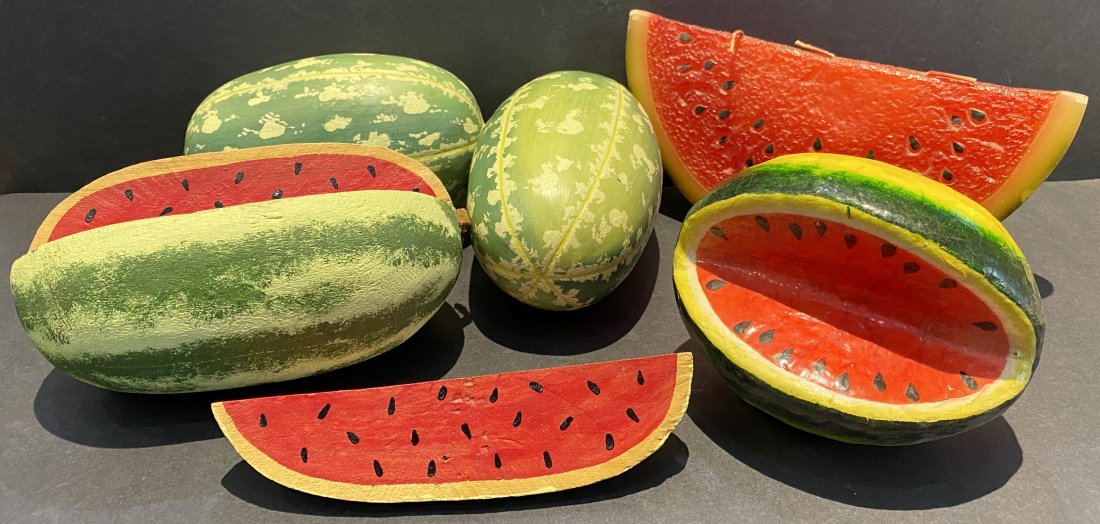 Six decorative watermelons , one wax , the others wood.: Six decorative watermelons,the largest one is 9" x 4".One is wax the others painted wood.-----------------------------------------------------------------------------From the Estate of Lloyd Williams,