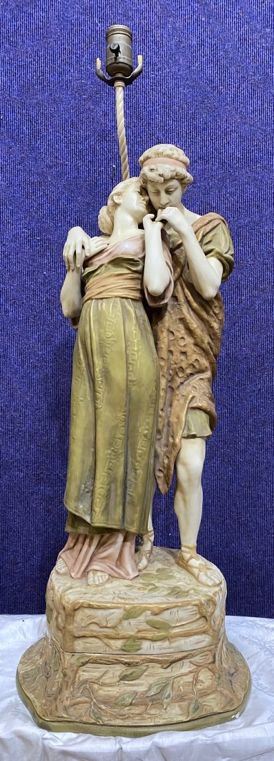 Royal Dux lamp, Roman youth and girl: Royal Dux lamp, Roman youth and girl figures are 25"high, with lamp mounting the lamp is 31" high.