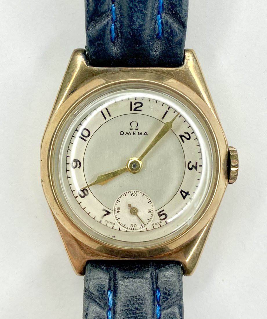9k gold Omega mans wrist watch with date of 1938: 9k gold Omega mans wrist watch with inscription and date of 1938. 15 jewel original movement. Running but not guaranteed to be working at any time.