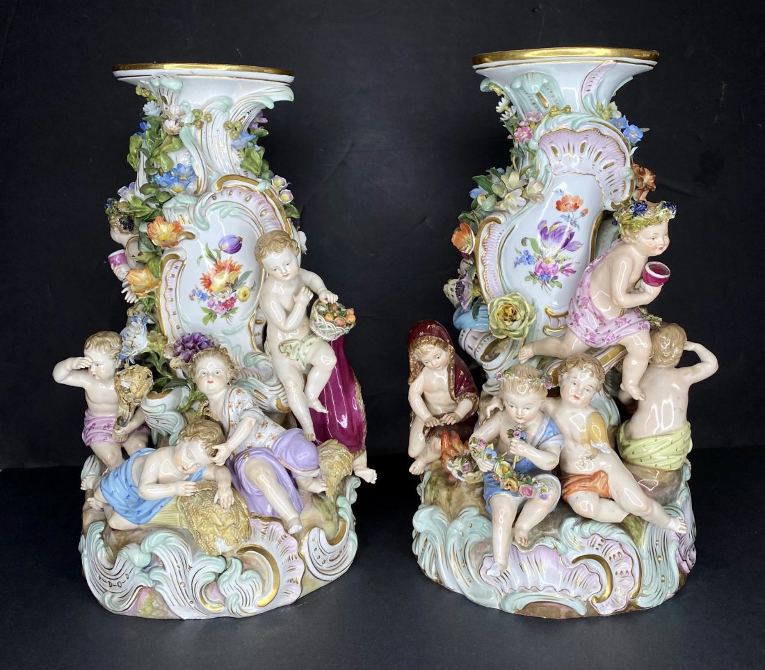 Pair of Meissen centerpieces, c1880-chips: Pair of Meissen centerpieces, c1880- chips Height: 13".One arm broken off half way down and restored at the shoulder.