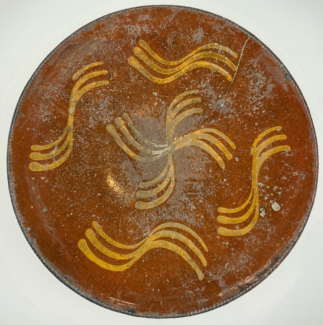 Redware plate,circa 1750: Redware plate, circa 1750 Diameter: 12"