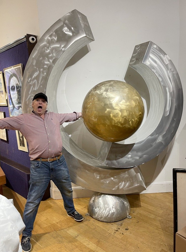 Huge sculp by Steve Zaluski,title:The Golden Seed,signd: Huge sculpture by Steve Zaluski, titled The Golden Seed, signed by the artist on the base and dated 2009 Approximately 7'2" wide and 8' tall This sculpture was removed from the backyard of a townhouse