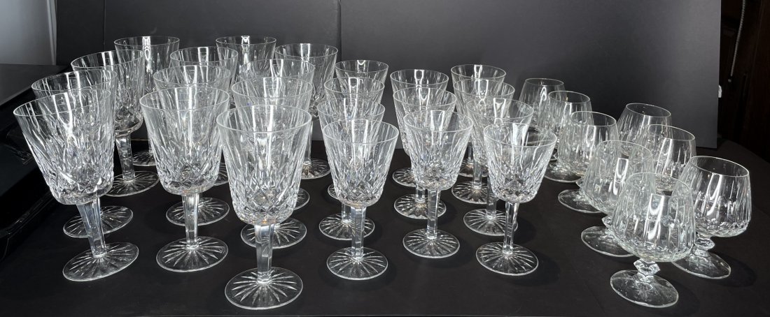 Set of 23 pieces of Waterford crystal,8 glass brandy: Set of 23 pieces of Waterford lead crystal signed stemware and 8 brandy snifter glasses Waterford white wine glasses (12): 7" tall Waterford red wine glasses (11): 6" tall (One is approx 1/8 inch shor