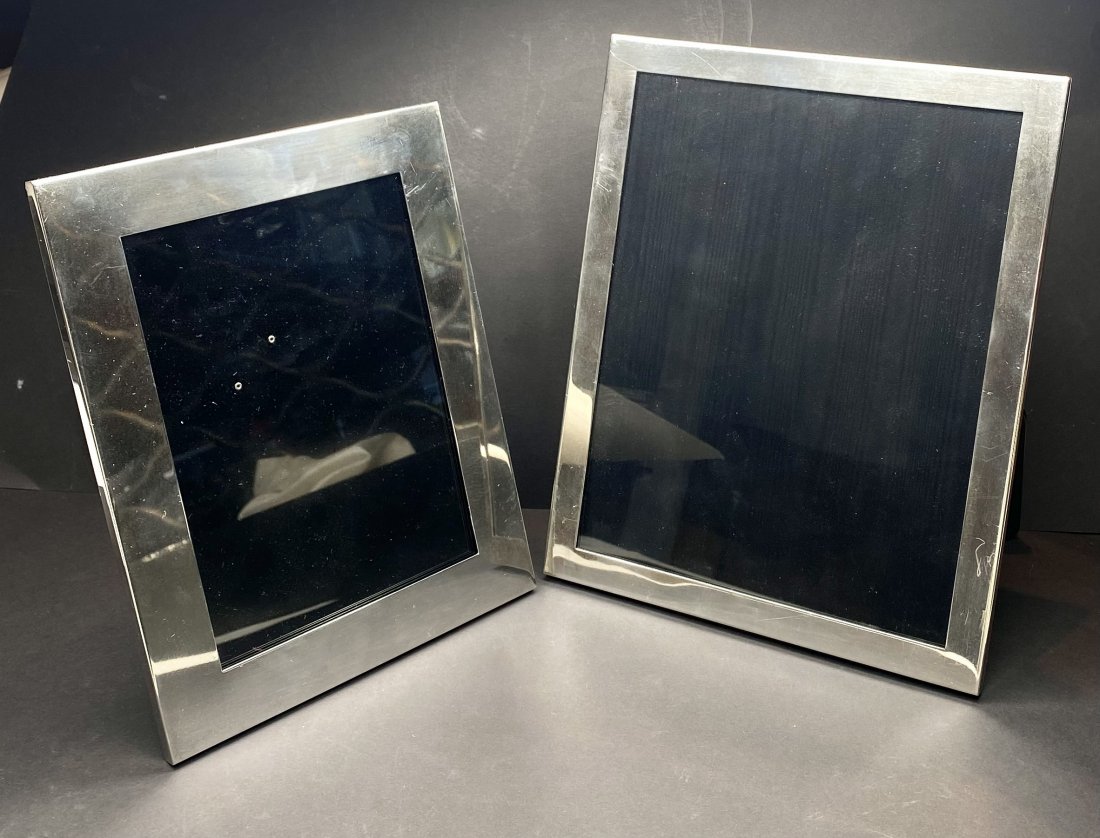 Two sterling silver Tiffany picture frames: Two sterling silver Tiffany picture frames, 9.25 oztSmaller frame: 7" x 9" Larger frame: 8" x 10"