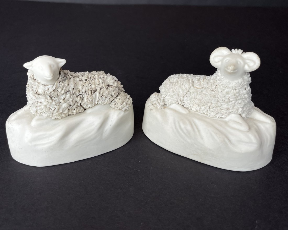 Two small ceramic sheep figurines, signed (1 of 10)