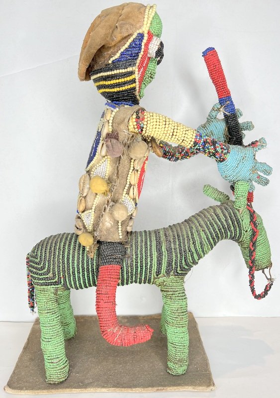 Yoruba beaded equestrian figure: Yoruba beaded equestrian figure 12"L x 5.25"W x 15.25"H
