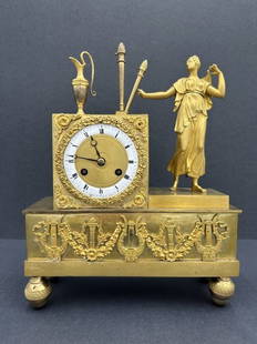 19th Century gilt bronze clock with Neoclassical figure: 19th Century gilt bronze clock with Neoclassical figure Approximate dimensions 10.75" H x 8.5" L x 3" W