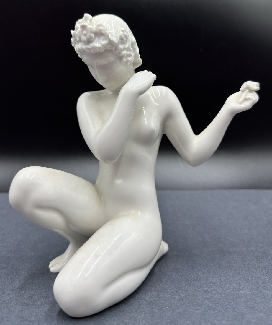 B&G figurine of nude girl holding flowers: B&G figurine of nude girl holding flowers Approximate Dimensions: 6.5 inches H by 6 inches W Good overall condition, restoration to left foot.----------------------------------------------------------