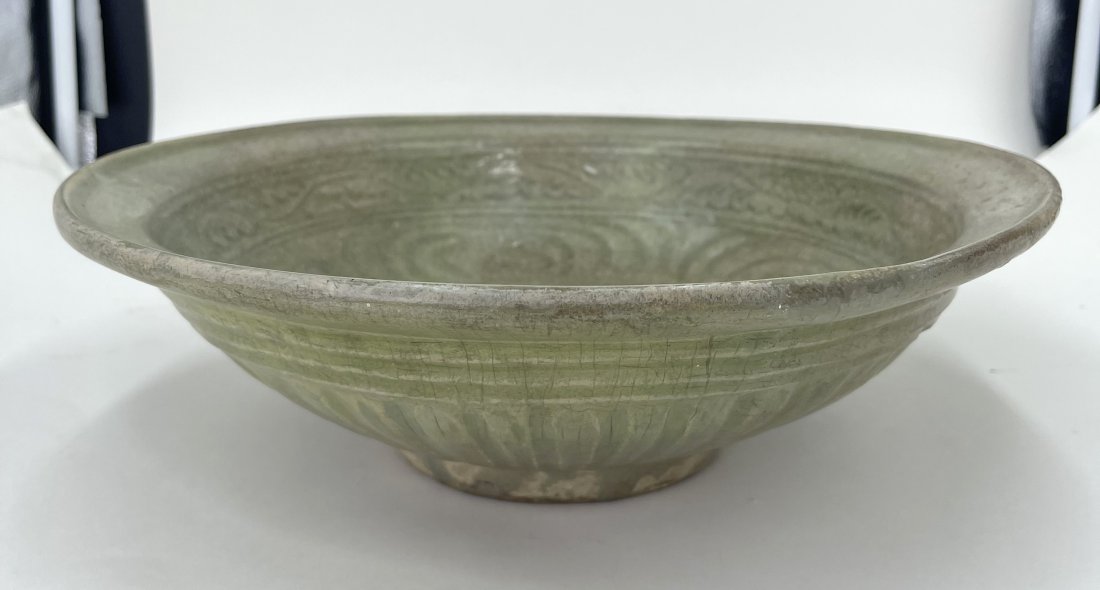 Chinese Longquan Hongwu celadon circa17thc/18thc: Chinese Longquan Hongwu celadon circa17thc/18thc Approximate Dimensions: 13.25 inches diameter by 4 inches H