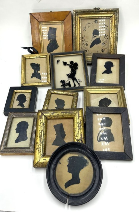 Twelve silhouettes: Twelve silhouettes Approximate Dimensions: Largest 3.75 inches by 4.75 inches sight to mat, Frame 6 inches by 7 inches.