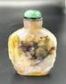 Carved agate snuff bottle, mythical creature