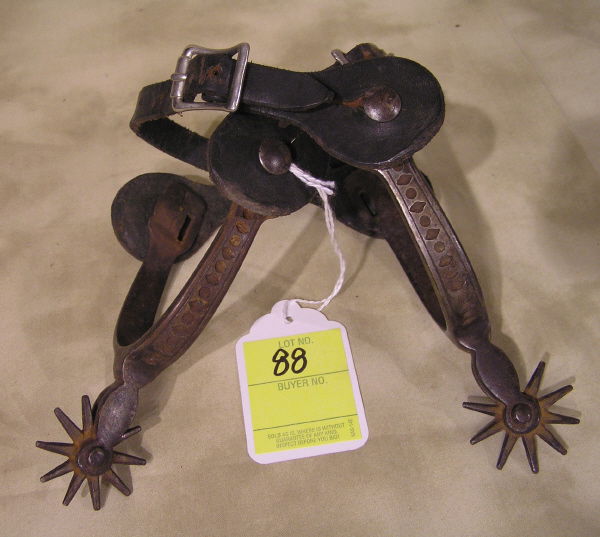 Pair of Buermann Spurs: Pair of Buermann Spurs with straps.