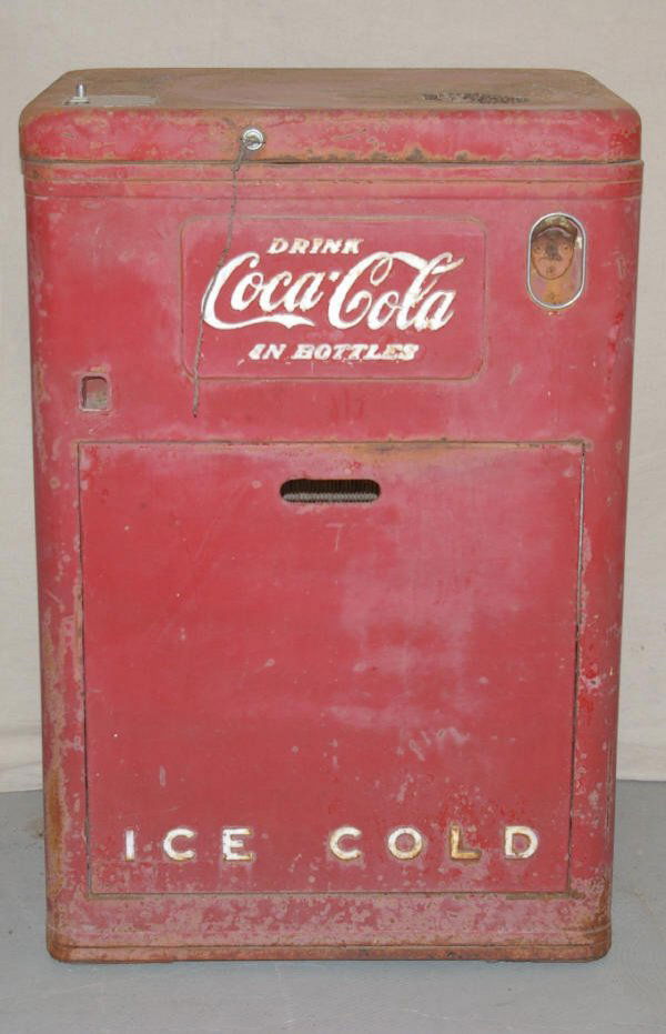 Old Vendo Bottled Coca Cola Machine: Bottled Coke Machine Model # 6066 Vendo Coke Machine 24" Wide x 20" Deep x 36" Tall Still has bottles in machine, needs restored.