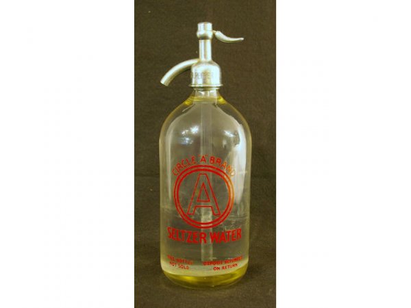 Vintage Circle A Dr Pepper Seltzer Bottle: Vintage Circle A Seltzer Bottle. Spigot marked "Dr Pepper Bott Co, Waco, Tex". Base marked "7" with makers mark. Measures 4" diameter x 12" tall.