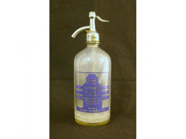 Vintage Dr Pepper Syphon Water Seltzer Bottle: Vintage Dr Pepper Syphon Water Seltzer Bottle. Marked Dr Pepper Bottling Co, Jefferson City, Missouri, Phone 2, Highly Carbonated". Spigot marked "National B. Co., St. Louis". Measures 3-1/2" diameter