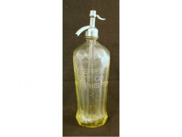 Vintage Dr Pepper Seltzer Bottle: Vintage Dr Pepper Seltzer Bottle. Marked "Dr Pepper Bott Co., Memphis, Ten". Measures 3-1/2" diameter x 12-1/2" tall.