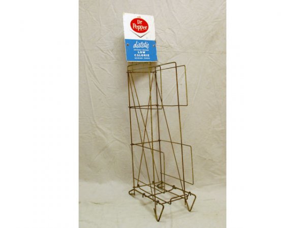 Dr Pepper Dietetic Bottle Rack Store Display: Vintage Chevron Dietetic Dr Pepper Bottle Rack. Circa 1960s. Measures 10" wide x 15" deep x 50-1/4" tall.