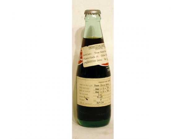 Dr Pepper Production Sample Japanese Bottle: Dr Pepper Pre-Production Sample Bottle For The Japanese Market. Was acquired from by Mrs Gotcher from a sales rep who assigned to Japan.With Paper Label; "Production Date May 2, 1980. Bottler: Tone Co