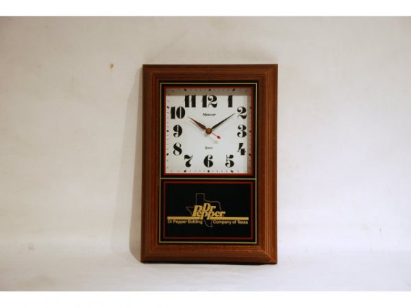 Dr Pepper Bottling Co. Clock: 1990s Dr. Pepper Battery Clock in Wooden Case. Dr. Pepper Bottling Company of Texas. In working condition. Measures 9-3/4" wide x 2-1/2" deep x 14-1/4" tall.