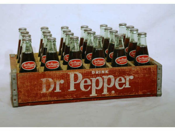 24 Dr Pepper Arlington Ballpark Opening Bottles: 24 Full Dr Pepper Arlington, Texas Ballpark "Opening Day" 8 Ounce Bottles with vintage wooden case Bottles are marked "April 11, 1994, Opening Day" with "The Ballpark in Arlington" logo. Case measures
