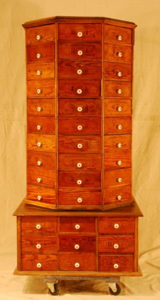 Antique Country Store Revolving Bolt Bin: Antique Country Store Revolving Bolt Bin. On Drawered Base.