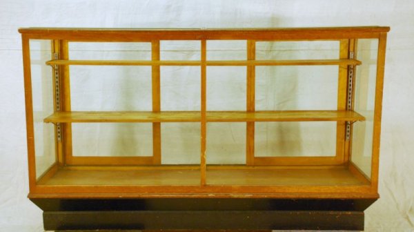 6ft Country Store Display Case: Missing one sliding door. Measures 71-1/2" L x 25-1/2" D x 42" H.