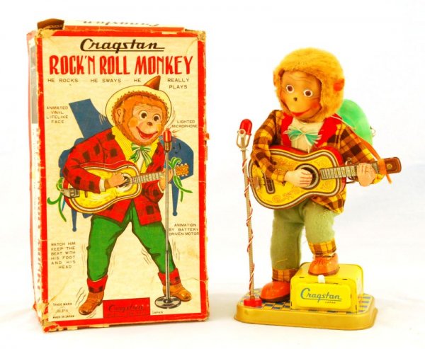 Cragstan Rock 'N' Roll Monkey Japanese Battery Op: Tin Mechanical Cragstan Rock 'N' Roll Monkey in Original Box. Battery operated. Not tested. Box measures 12" H.