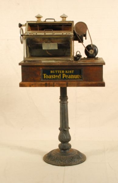 Butter-Kist Toasted Peanut Roaster on Pedestal: Butter-Kist Toasted Peanut Roaster. With Stand. Not tested. Measures 28-1/4 W x 18" D x 24" H. Dmaged Glass"