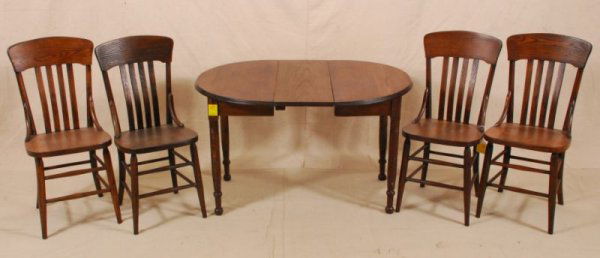 Child's Table and Chair: Child's Table and Chair Includes 1 leaf. Table measures 39-3/4 L (with leaf) x 30" D x 24" H. Chair is 31" H."