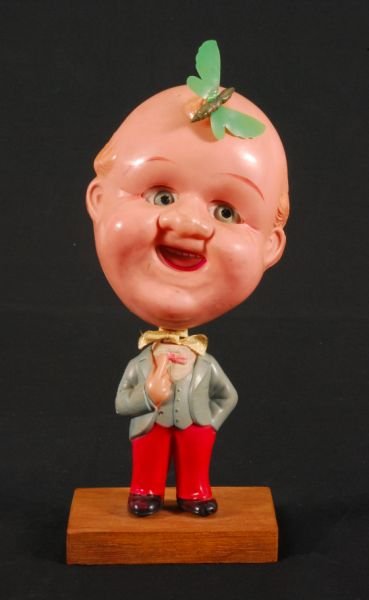 Mr. Big Head Celluloid Wind-Up Toy: Mr. Big Head Celluloid Wind-Up Toy. Paper label marked "Made in Japan". Measures 9" H.